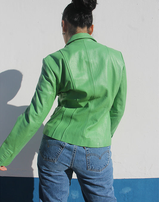 Rear view of the green leather blazer showing its tailored fit and clean silhouette.