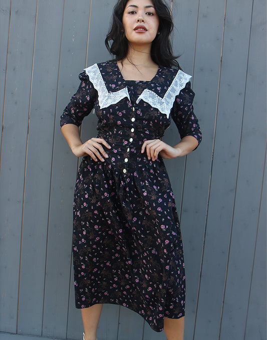 black floral midi dress with sleeves