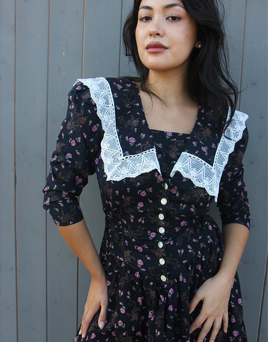 black floral midi dress with sleeves