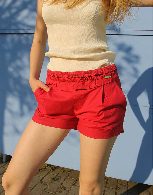red shorts